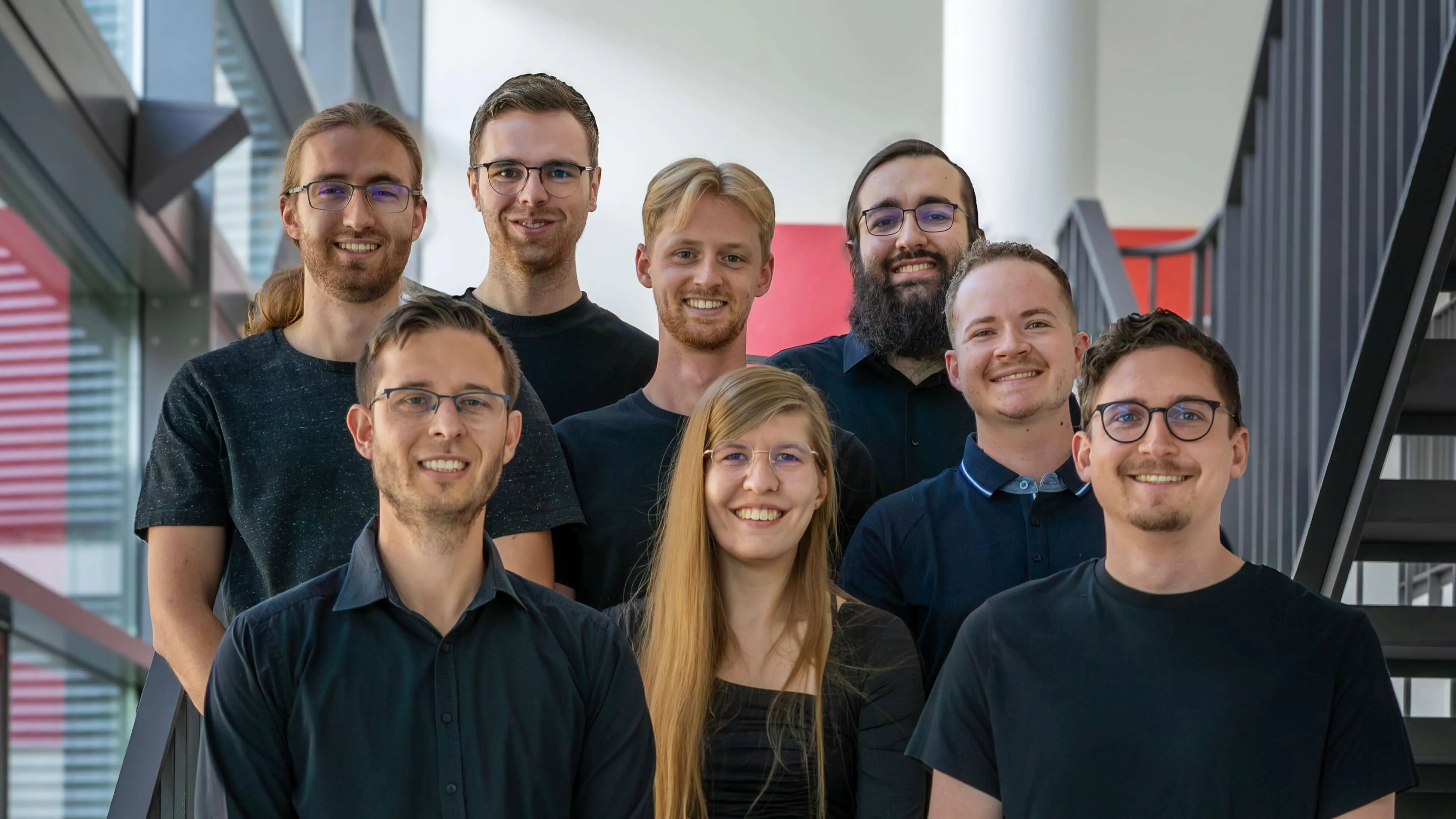 The CipherCell team on a staircase in the offices in Passau.